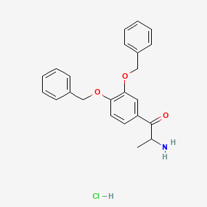 B1140090 2-Amino-3',4'-dibenzyloxypropiophenone hydrochloride CAS No. 1219199-37-7