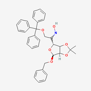 molecular formula C₃₅H₃₅NO₆ B1140175 Benzyl 2,3-O-Isopropylidene-6-O-trityl-5-keto-alpha-D-mannofuranoside, 5-Oxime CAS No. 91364-14-6