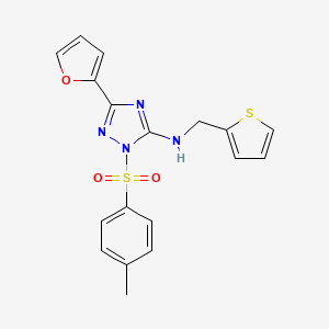 3-(furan-2-yl)-1-[(4-methylphenyl)sulfonyl]-N-(thiophen-2-ylmethyl)-1H-1,2,4-triazol-5-amine