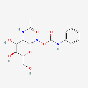 molecular formula C₁₅H₁₉N₃O₇ B1140623 [[(5S)-3-Acetamido-4,5-dihydroxy-6-(hydroxymethyl)oxan-2-ylidene]amino] N-phenylcarbamate CAS No. 350508-25-7