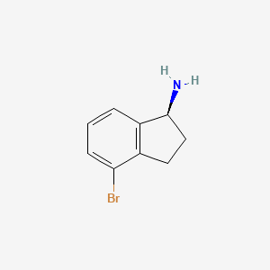 B1141567 (S)-4-bromo-2,3-dihydro-1H-inden-1-amine CAS No. 1228570-71-5