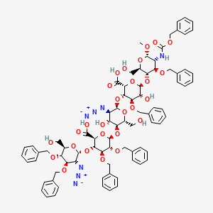 B1142318 (2R,3S,4R,5R,6R)-3-[(2R,3R,4R,5S,6R)-3-azido-5-[(2R,3R,4S,5S,6S)-5-[(2R,3R,4R,5S,6R)-3-azido-6-(hydroxymethyl)-4,5-bis(phenylmethoxy)oxan-2-yl]oxy-6-carboxy-3,4-bis(phenylmethoxy)oxan-2-yl]oxy-4-hydroxy-6-(hydroxymethyl)oxan-2-yl]oxy-5-hydroxy-6-[(2R,3S,4R,5R,6S)-2-(hydroxymethyl)-6-methoxy-4-phenylmethoxy-5-(phenylmethoxycarbonylamino)oxan-3-yl]oxy-4-phenylmethoxyoxane-2-carboxylic acid CAS No. 114903-05-8