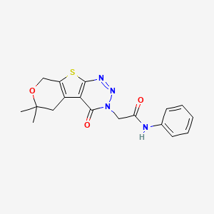 molecular formula C18H18N4O3S B11465516 2-(6,6-Dimethyl-4-oxo-5,8-dihydro-4H,6H-7-oxa-9-thia-1,2,3-triaza-fluoren-3-yl)-N-phenyl-acetamide 