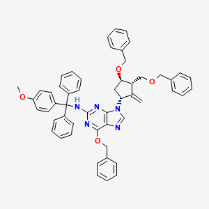 B1146563 N-[(4-methoxyphenyl)-diphenylmethyl]-9-[(1R,3S,4R)-2-methylidene-4-phenylmethoxy-3-(phenylmethoxymethyl)cyclopentyl]-6-phenylmethoxypurin-2-amine CAS No. 1354695-79-6