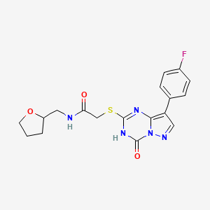 2-{[8-(4-fluorophenyl)-4-oxo-3,4-dihydropyrazolo[1,5-a][1,3,5]triazin-2-yl]sulfanyl}-N-(tetrahydrofuran-2-ylmethyl)acetamide