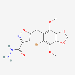 molecular formula C14H16BrN3O6 B11472978 5-[(6-Bromo-4,7-dimethoxy-1,3-benzodioxol-5-yl)methyl]-4,5-dihydro-1,2-oxazole-3-carbohydrazide 