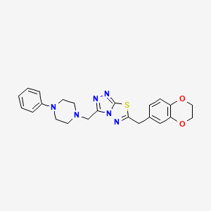 molecular formula C23H24N6O2S B11473628 6-(2,3-Dihydro-1,4-benzodioxin-6-ylmethyl)-3-[(4-phenylpiperazin-1-yl)methyl][1,2,4]triazolo[3,4-b][1,3,4]thiadiazole 