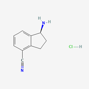 B1149014 (S)-1-Amino-2,3-dihydro-1H-indene-4-carbonitrile hydrochloride CAS No. 1213099-69-4