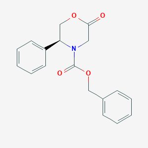 molecular formula C18H17NO4 B115061 (5S)-3,4,5,6-Tetrahydro-5-phenyl-N-(benzyloxycarbonyl)-4(H)-1,4-oxazin-2-one CAS No. 147700-91-2