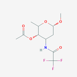 molecular formula C₁₁H₁₆F₃NO₅ B1150972 [(3S,6S)-6-methoxy-2-methyl-4-[(2,2,2-trifluoroacetyl)amino]oxan-3-yl] acetate 