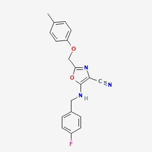 5-[(4-Fluorobenzyl)amino]-2-[(4-methylphenoxy)methyl]-1,3-oxazole-4-carbonitrile