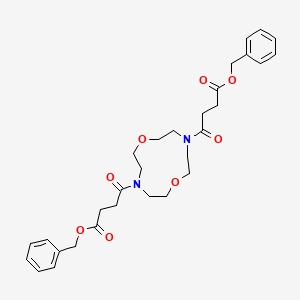 Dibenzyl 4,4'-(1,7-dioxa-4,10-diazacyclododecane-4,10-diyl)bis(4-oxobutanoate)