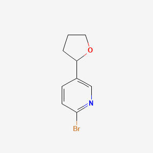 2-Bromo-5-(oxolan-2-yl)pyridine