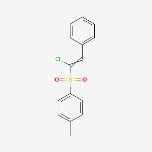 molecular formula C15H13ClO2S B11713780 1-(1-Chloro-2-phenylethenesulfonyl)-4-methylbenzene 