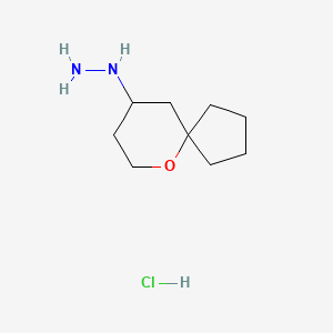 {6-Oxaspiro[4.5]decan-9-yl}hydrazine hydrochloride