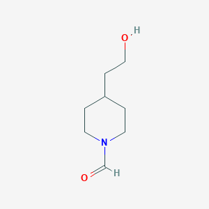 molecular formula C8H15NO2 B117235 4-(2-羟乙基)哌啶-1-甲醛 CAS No. 141047-47-4