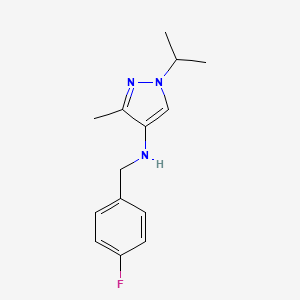 molecular formula C14H18FN3 B11727660 N-[(4-fluorophenyl)methyl]-3-methyl-1-(propan-2-yl)-1H-pyrazol-4-amine 