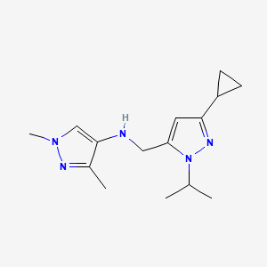 molecular formula C15H23N5 B11730356 N-{[3-cyclopropyl-1-(propan-2-yl)-1H-pyrazol-5-yl]methyl}-1,3-dimethyl-1H-pyrazol-4-amine 