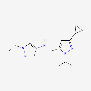 molecular formula C15H23N5 B11730617 N-{[3-cyclopropyl-1-(propan-2-yl)-1H-pyrazol-5-yl]methyl}-1-ethyl-1H-pyrazol-4-amine 