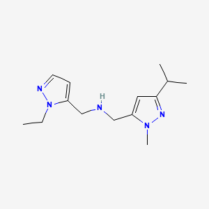 molecular formula C14H23N5 B11734949 [(1-ethyl-1H-pyrazol-5-yl)methyl]({[1-methyl-3-(propan-2-yl)-1H-pyrazol-5-yl]methyl})amine 