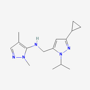 molecular formula C15H23N5 B11737087 N-{[3-cyclopropyl-1-(propan-2-yl)-1H-pyrazol-5-yl]methyl}-1,4-dimethyl-1H-pyrazol-5-amine 