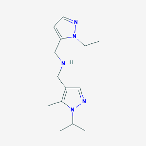 molecular formula C14H23N5 B11737220 [(1-ethyl-1H-pyrazol-5-yl)methyl]({[5-methyl-1-(propan-2-yl)-1H-pyrazol-4-yl]methyl})amine 