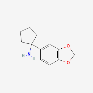 molecular formula C12H15NO2 B11739163 1-(1,3-Benzodioxol-5-yl)cyclopentanamine 