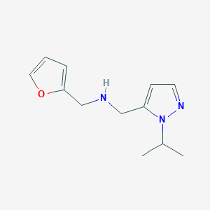 molecular formula C12H17N3O B11739849 [(furan-2-yl)methyl]({[1-(propan-2-yl)-1H-pyrazol-5-yl]methyl})amine 