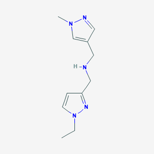 molecular formula C11H17N5 B11741535 [(1-ethyl-1H-pyrazol-3-yl)methyl][(1-methyl-1H-pyrazol-4-yl)methyl]amine 