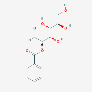 (2S,3S,4R,5R)-3,4,5,6-tetrahydroxy-1-oxohexan-2-yl benzoate