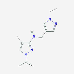 molecular formula C13H21N5 B11744346 N-[(1-ethyl-1H-pyrazol-4-yl)methyl]-4-methyl-1-(propan-2-yl)-1H-pyrazol-3-amine 