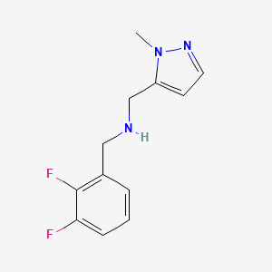 molecular formula C12H13F2N3 B11744797 [(2,3-difluorophenyl)methyl][(1-methyl-1H-pyrazol-5-yl)methyl]amine 