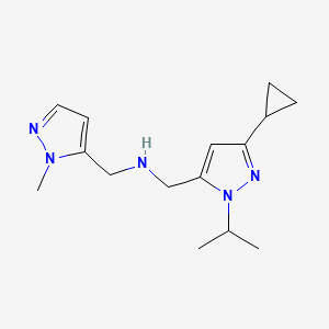 molecular formula C15H23N5 B11745289 {[3-cyclopropyl-1-(propan-2-yl)-1H-pyrazol-5-yl]methyl}[(1-methyl-1H-pyrazol-5-yl)methyl]amine 