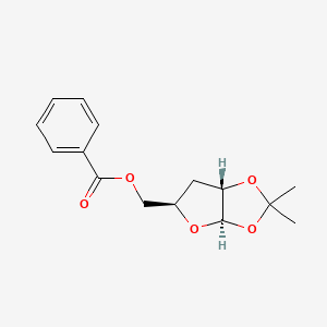 molecular formula C15H18O5 B11745317 [(3aR,5R,6aS)-2,2-dimethyl-tetrahydro-2H-furo[2,3-d][1,3]dioxol-5-yl]methyl benzoate 