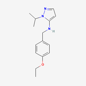 molecular formula C15H21N3O B11745359 N-[(4-ethoxyphenyl)methyl]-1-(propan-2-yl)-1H-pyrazol-5-amine 