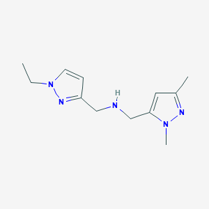 molecular formula C12H19N5 B11745412 [(1,3-dimethyl-1H-pyrazol-5-yl)methyl][(1-ethyl-1H-pyrazol-3-yl)methyl]amine 