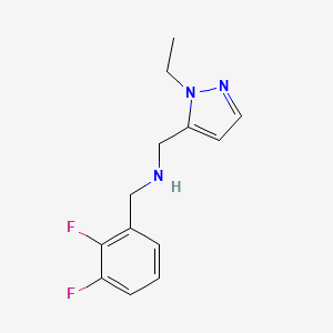 molecular formula C13H15F2N3 B11745896 [(2,3-difluorophenyl)methyl][(1-ethyl-1H-pyrazol-5-yl)methyl]amine 