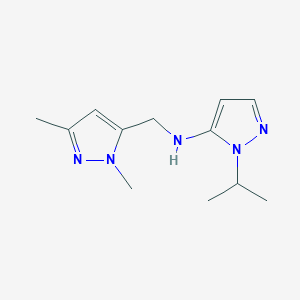 molecular formula C12H19N5 B11746229 N-[(1,3-dimethyl-1H-pyrazol-5-yl)methyl]-1-(propan-2-yl)-1H-pyrazol-5-amine 