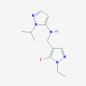 molecular formula C12H18FN5 B11748029 N-[(1-ethyl-5-fluoro-1H-pyrazol-4-yl)methyl]-1-(propan-2-yl)-1H-pyrazol-5-amine 