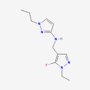 molecular formula C12H18FN5 B11748461 N-[(1-ethyl-5-fluoro-1H-pyrazol-4-yl)methyl]-1-propyl-1H-pyrazol-3-amine 