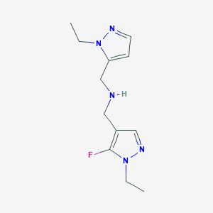 molecular formula C12H18FN5 B11748830 [(1-ethyl-1H-pyrazol-5-yl)methyl][(1-ethyl-5-fluoro-1H-pyrazol-4-yl)methyl]amine 