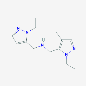 molecular formula C13H21N5 B11750273 [(1-ethyl-1H-pyrazol-5-yl)methyl][(1-ethyl-4-methyl-1H-pyrazol-5-yl)methyl]amine 