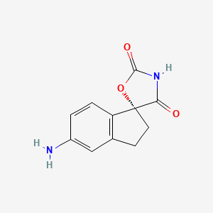 (R)-5-Amino-2,3-dihydrospiro[indene-1,5'-oxazolidine]-2',4'-dione