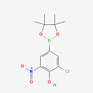 molecular formula C12H15BClNO5 B11756822 2-Chloro-6-nitro-4-(tetramethyl-1,3,2-dioxaborolan-2-yl)phenol 