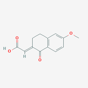 2-[(2E)-6-methoxy-1-oxo-1,2,3,4-tetrahydronaphthalen-2-ylidene]acetic acid