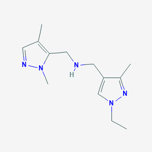 molecular formula C13H21N5 B11758901 [(1,4-dimethyl-1H-pyrazol-5-yl)methyl][(1-ethyl-3-methyl-1H-pyrazol-4-yl)methyl]amine 