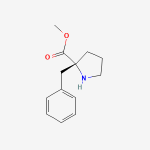 methyl (2R)-2-benzylpyrrolidine-2-carboxylate