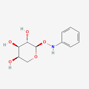 molecular formula C11H15NO5 B1182683 2-(anilinooxy)tetrahydro-2H-pyran-3,4,5-triol 