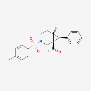 molecular formula C20H21NO3S B11831430 (1S,6R,7S)-3-(4-methylbenzenesulfonyl)-7-phenyl-3-azabicyclo[4.1.0]heptane-1-carbaldehyde 