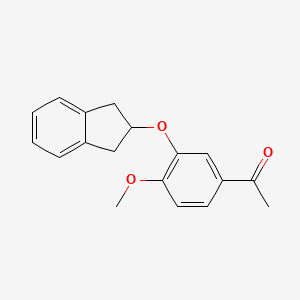 molecular formula C18H18O3 B11845494 1-{3-[(2,3-Dihydro-1H-inden-2-yl)oxy]-4-methoxyphenyl}ethan-1-one CAS No. 115898-73-2